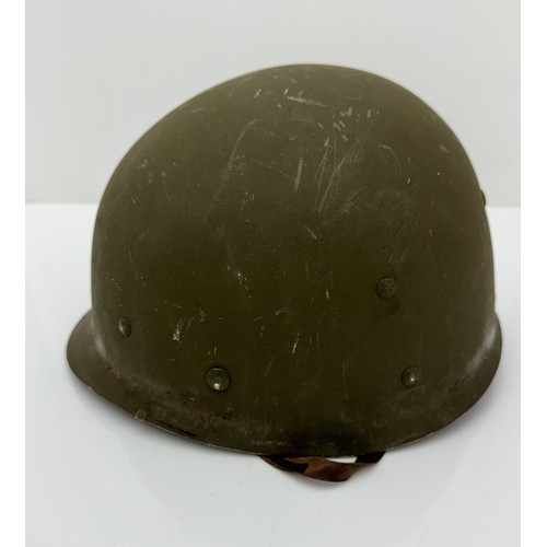 119 - Complete original WWII US Helmet. Indistinct number to inner rim on helmet shell, possibly 0077. Lin... 