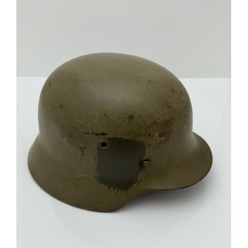 66 - A German M35 ET-64 Norwegian used helmet with original German liner band.