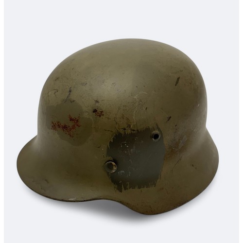 66 - A German M35 ET-64 Norwegian used helmet with original German liner band.