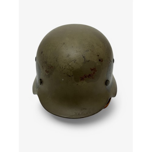 66 - A German M35 ET-64 Norwegian used helmet with original German liner band.