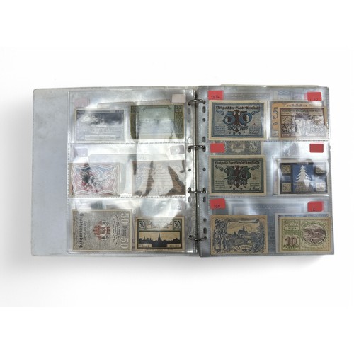 405 - World banknotes collection in 2 albums and a box, condition is mixed, one album of German notes with... 