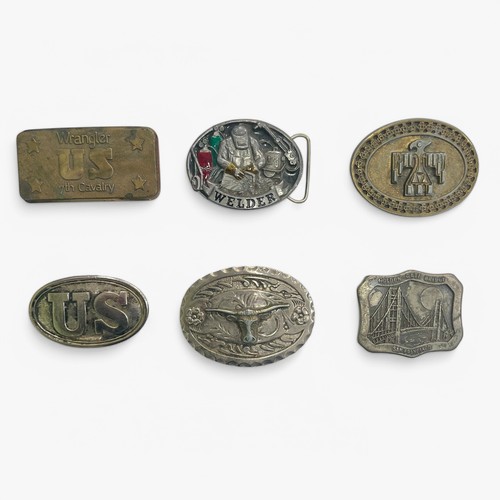 145 - Range of six belt buckles, including Wrangler US 7th Cavalry, Welder, US, Golden Gate Bridge and two... 