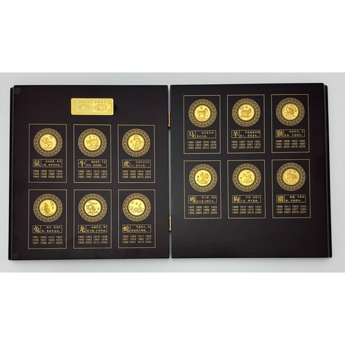 175 - China 24K gold-plater Chinese Zodiac animal medallions set of 12 in wooden presentation folder with ... 