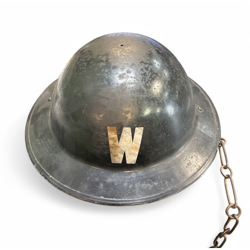 110 - British WW2 home front wardens helmet.