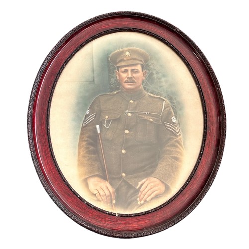 100 - WW1 era oval framed coloured studio photo of a Colour Sergeant in the Sussex Regiment, three quarter... 