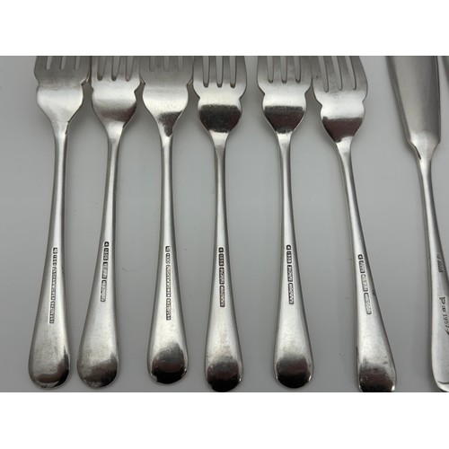 124A - Silver plated military flatware, smaller forks marked for Walker & Hall, the rest a mix of makers. S... 