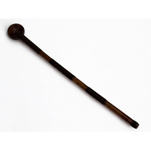 121A - Zulu 19th century ceremonial or induna's darkwood knobkerrie, small head, the haft largely covered w... 