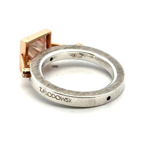 A contemporary Tomasz Plodowski sterling silver and 14ct gold ring, set ...