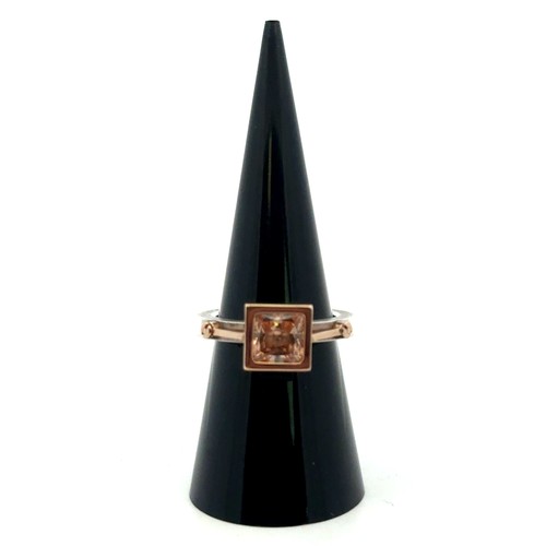 A contemporary Tomasz Plodowski sterling silver and 14ct gold ring, set ...