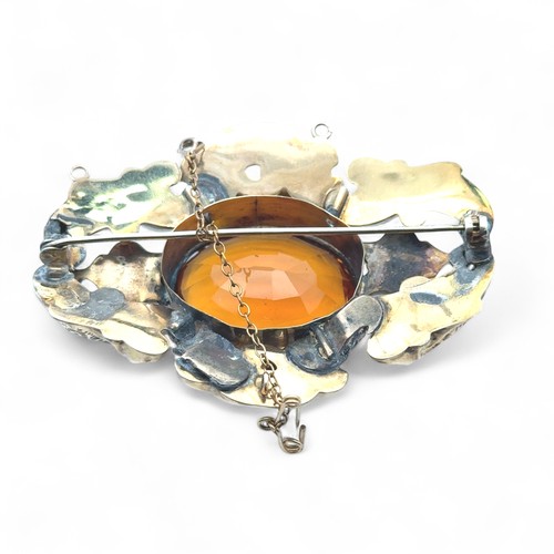 11 - An antique citrine brooch, tested as 9ct with XRF, approx 6.5cm length. 20.0g