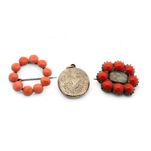 25 - A yellow metal and coral mourning brooch with glazed panel containing woven hair work 28mm wide, a c... 