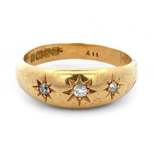 14 - Am 18ct gold and diamond gypsy ring, size P. Birmingham hallmarks.
