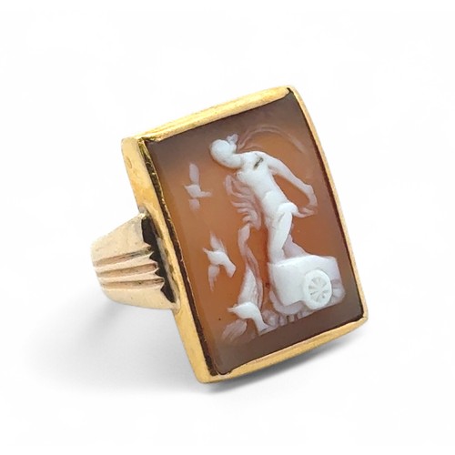 6 - Cameo ring - an unmarked yellow metal set with a rectangular cameo depicting the goddess Aphrodite r... 