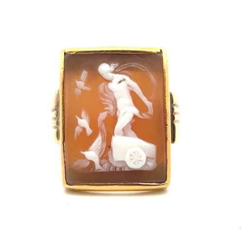 6 - Cameo ring - an unmarked yellow metal set with a rectangular cameo depicting the goddess Aphrodite r... 
