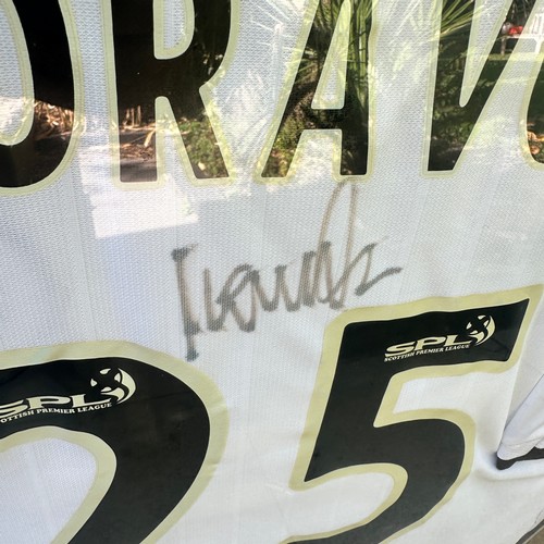 16 - Signed Lubomir Moravcik Shirt. With signature above his shirt number '25'. Framed and glazed.