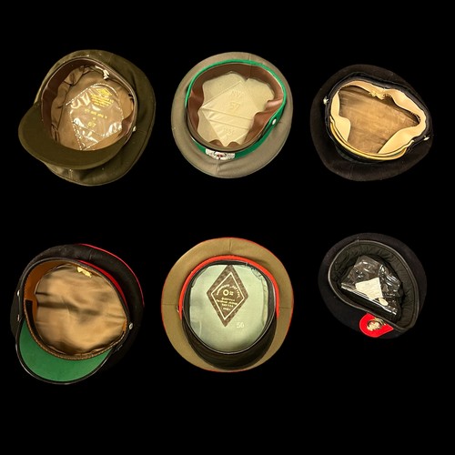 109 - Military hats, range of six military hats / caps, includes; British Military peaked cap (Welsh Guard... 