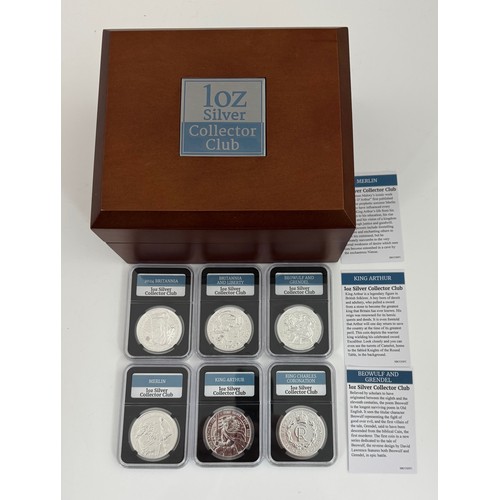 234 - The 1oz Silver Collector Club range of six coins, each in hard plastic Danbury Mint case within a wo... 
