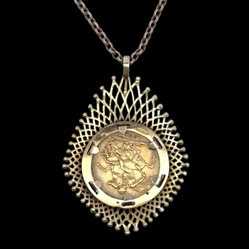 31 - A 1874 sovereign mounted as a pendant necklace in 9ct gold,  on a chain stamped 9ct.