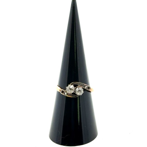 28 - Old cut diamond twist ring, stamped 18ct.  Missing a diamond on each shoulder. Size N.