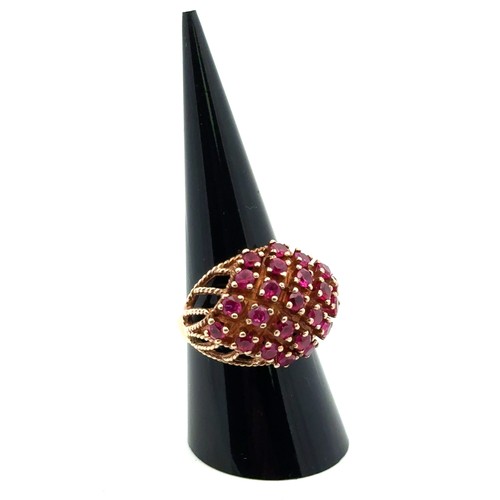 1 - A 1970s 9ct gold ruby bombe ring, size P. Birmingham 1972. 6.68g