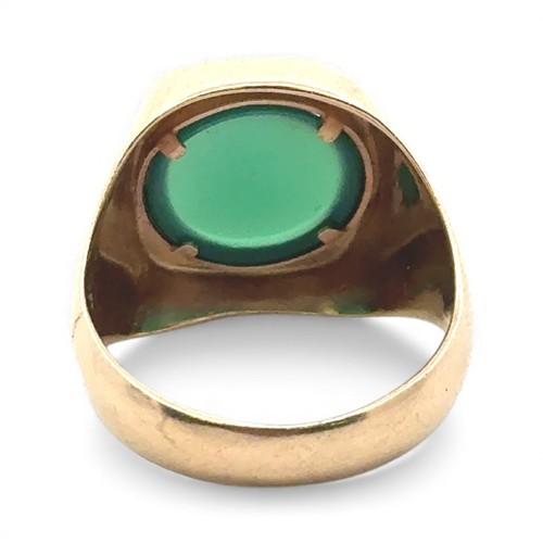 45 - A 9ct gold signet ring set with a circular chrysoprase, size U. Ring head 18mm x 16mm.