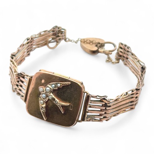 22 - A gold gate link bracelet locket set with seed pearls,  the locket 25mm x 21mm.
18.39g