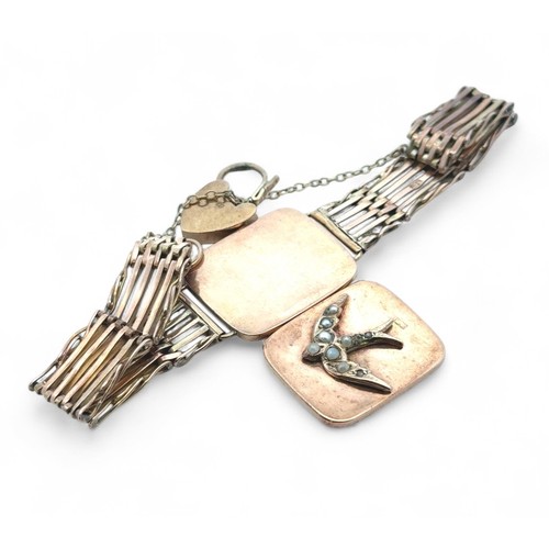 22 - A gold gate link bracelet locket set with seed pearls,  the locket 25mm x 21mm.
18.39g