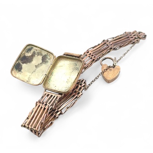 22 - A gold gate link bracelet locket set with seed pearls,  the locket 25mm x 21mm.
18.39g