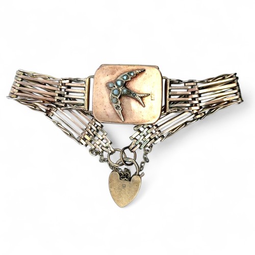 22 - A gold gate link bracelet locket set with seed pearls,  the locket 25mm x 21mm.
18.39g