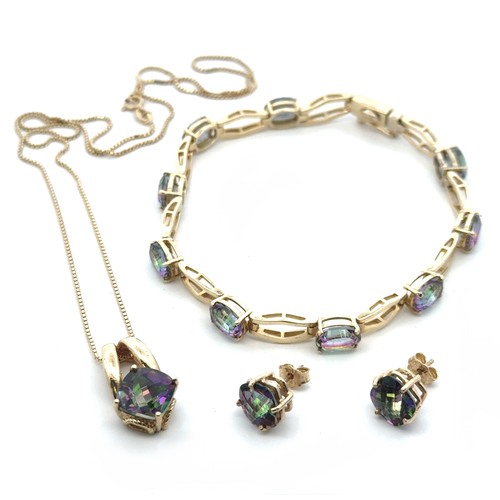 54 - A rose cut mystic topaz necklace, bracelet and earring set,  stamped 14k. Bracelet with nine oval st... 