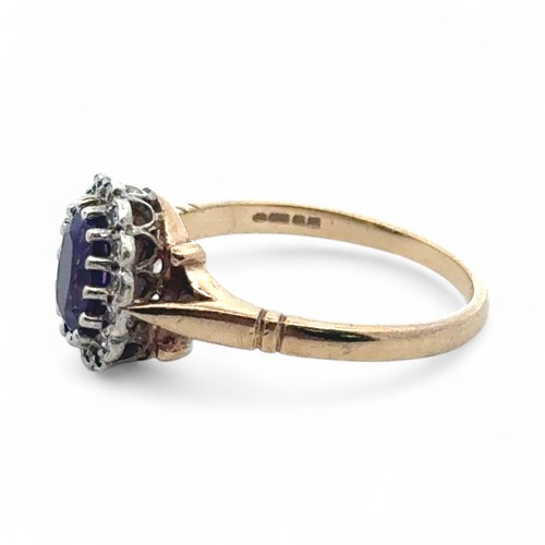35 - Amethyst and diamond cluster ring in 9ct yellow gold. Size N. 2.7g