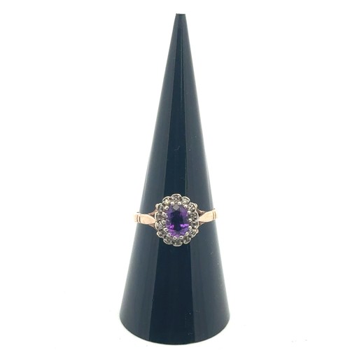 35 - Amethyst and diamond cluster ring in 9ct yellow gold. Size N. 2.7g
