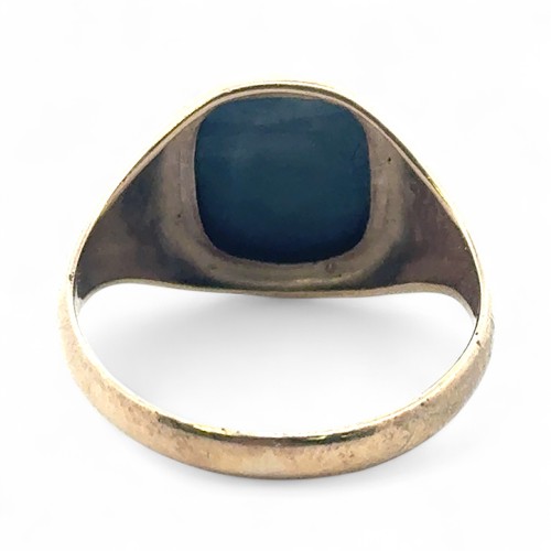 4 - A haematite centurion intaglio signet ring in 9ct yellow gold, size U.
