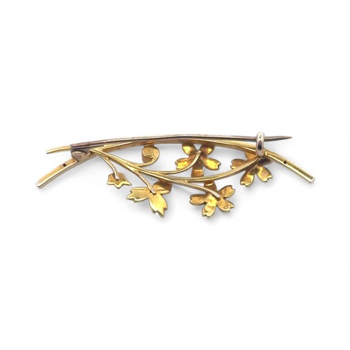 20 - An unmarked yellow metal seed pearl spray brooch, tested as 15ct gold, pin tested as approx 9ct. Len... 