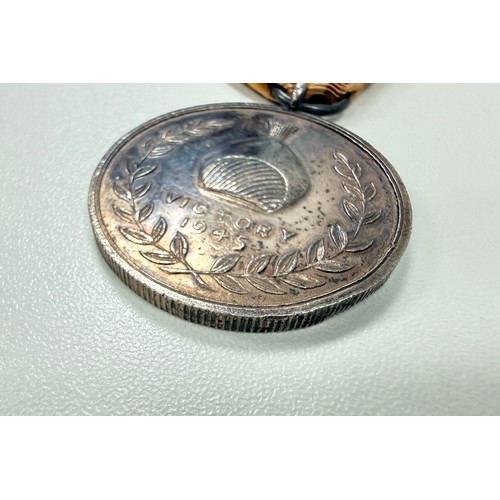 96 - Hyderabad, a Hyderabad Victory Medal 1945, silver, 35mm. Scarce medal, only 3200 struck. With ribbon... 