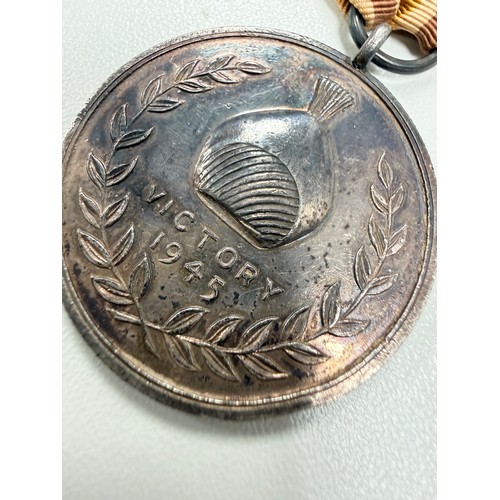 96 - Hyderabad, a Hyderabad Victory Medal 1945, silver, 35mm. Scarce medal, only 3200 struck. With ribbon... 