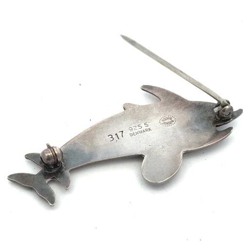 30 - A Georg Jensen silver twin dolphin brooch, pattern No. 317. 41mm in length. Reverse signed and marke... 