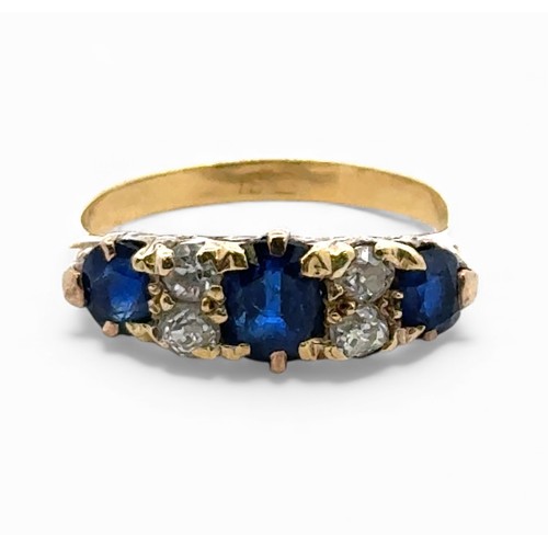 22 - A sapphire and old cut diamond half hoop ring in yellow metal mount stamped 18ct. Size O/P. 3.5g. Wi... 