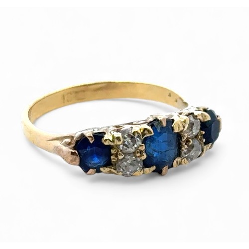22 - A sapphire and old cut diamond half hoop ring in yellow metal mount stamped 18ct. Size O/P. 3.5g. Wi... 