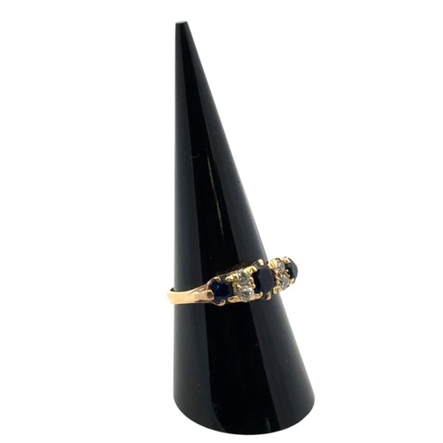 22 - A sapphire and old cut diamond half hoop ring in yellow metal mount stamped 18ct. Size O/P. 3.5g. Wi... 