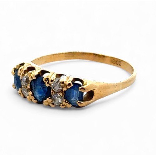 47 - A vintage sapphire and old cut diamond ring stamped 18ct, size Q.