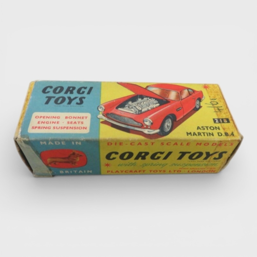 31 - Corgi No. 218 Aston Martin DB4, yellow with red interior and spoked hubs, generally excellent to goo... 