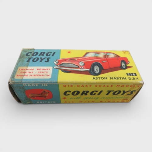 31 - Corgi No. 218 Aston Martin DB4, yellow with red interior and spoked hubs, generally excellent to goo... 