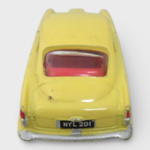 31 - Corgi No. 218 Aston Martin DB4, yellow with red interior and spoked hubs, generally excellent to goo... 