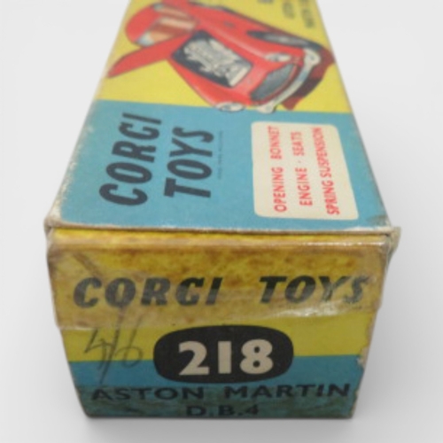 31 - Corgi No. 218 Aston Martin DB4, yellow with red interior and spoked hubs, generally excellent to goo... 