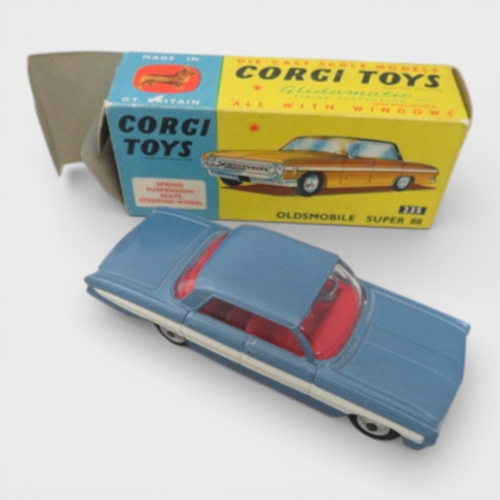36 - Corgi No. 235 Oldsmobile Super 88, generally excellent in excellent to good plus box, metallic blue ... 