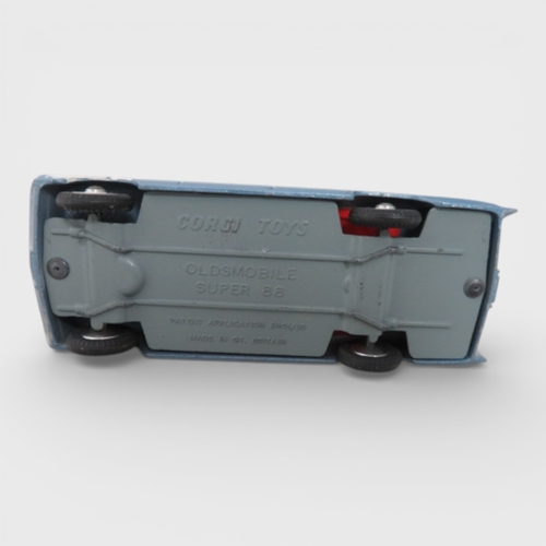 36 - Corgi No. 235 Oldsmobile Super 88, generally excellent in excellent to good plus box, metallic blue ... 