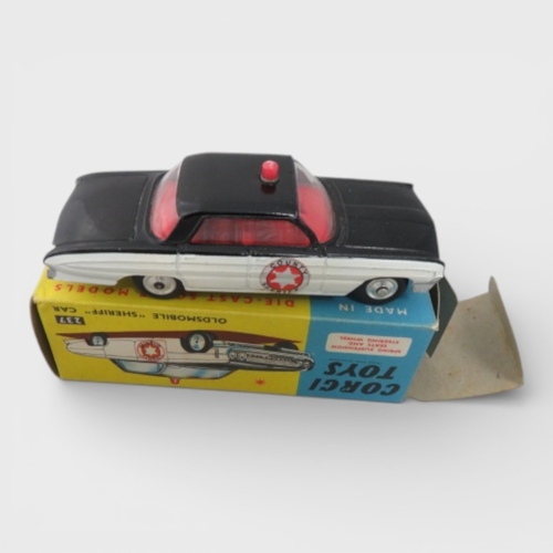 37 - Corgi No. 237 Oldsmobile County Sheriff black and white, generally excellent in good plus box (ink m... 