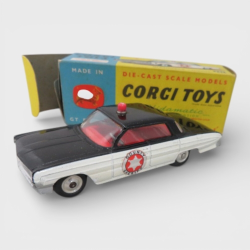 37 - Corgi No. 237 Oldsmobile County Sheriff black and white, generally excellent in good plus box (ink m... 