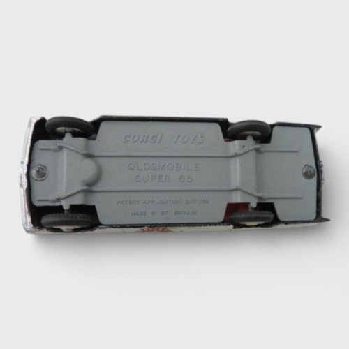 37 - Corgi No. 237 Oldsmobile County Sheriff black and white, generally excellent in good plus box (ink m... 